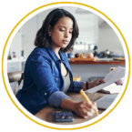 woman-paying-bills woman-paying-bills