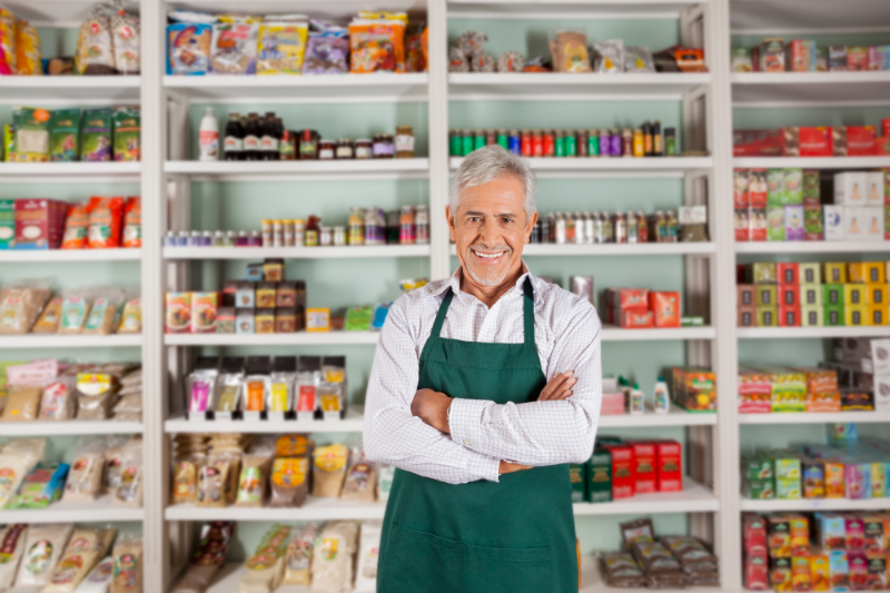 store owner with products